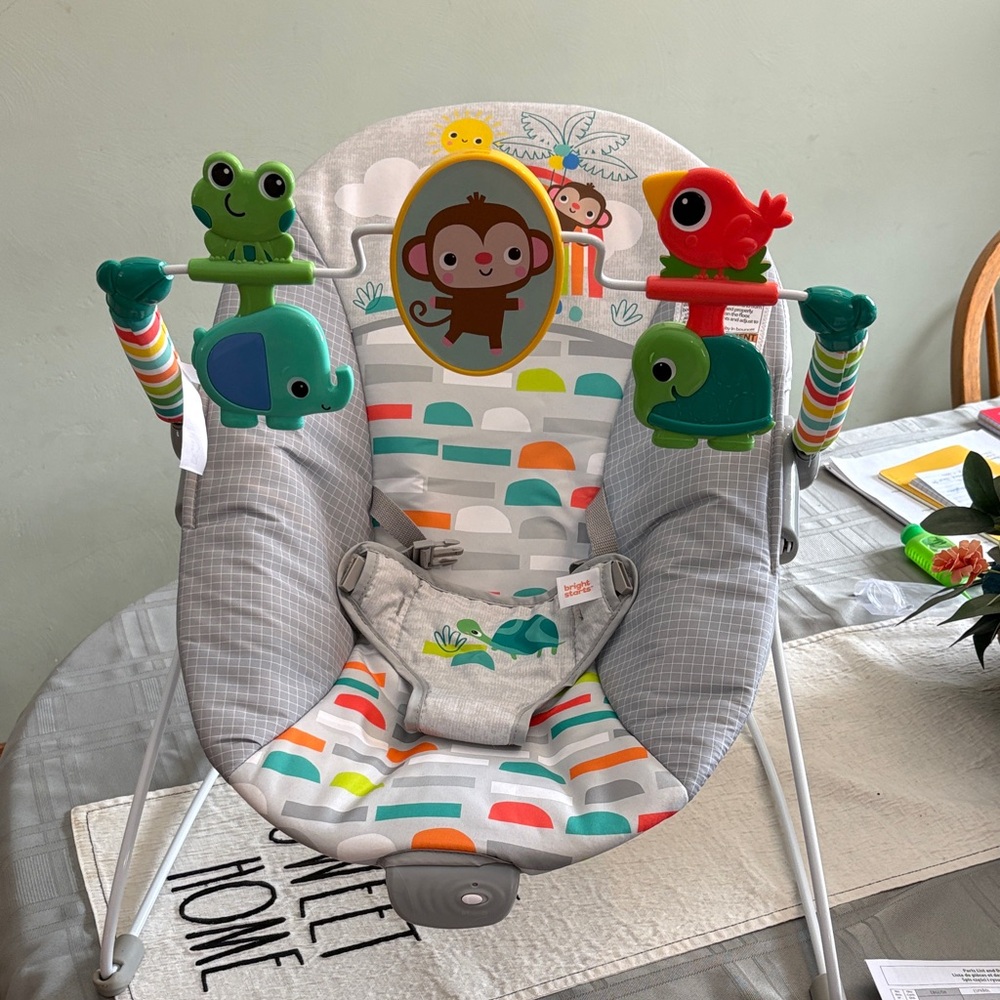 Gray Baby Bouncer Seat with Colorful Animal Toy Bar